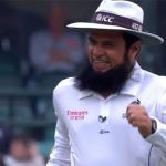 Cricket Records: Aleem Dar Umpire With Most ODIs Cricket umpire with a beard, wearing an ICC hat, smiling and celebrating during a match. The image captures his joyful reaction after making a significant decision, highlighting his role in setting cricket umpire records.